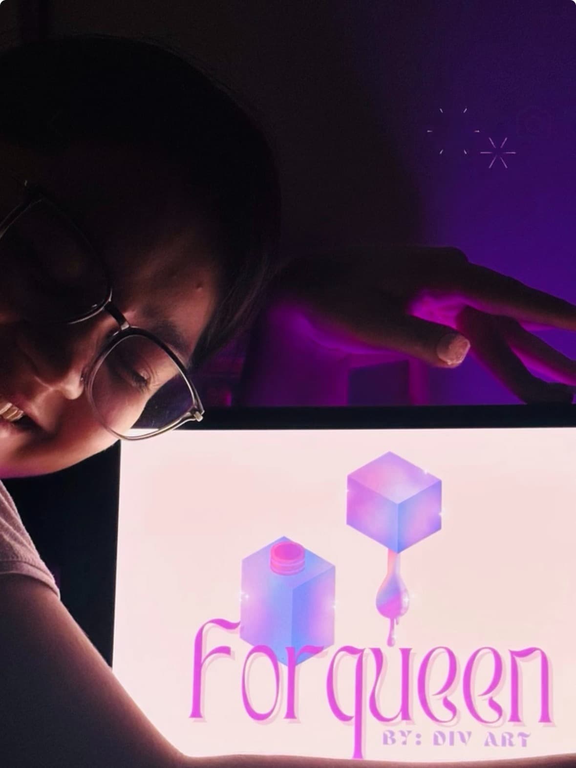 Divya — Founder of ForQueen, holding the ForQueen logo on a lightbox